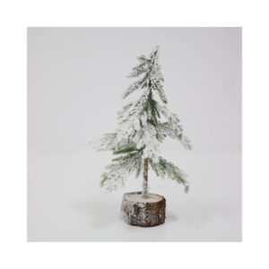 Bor na drvenom postolju zasniježen